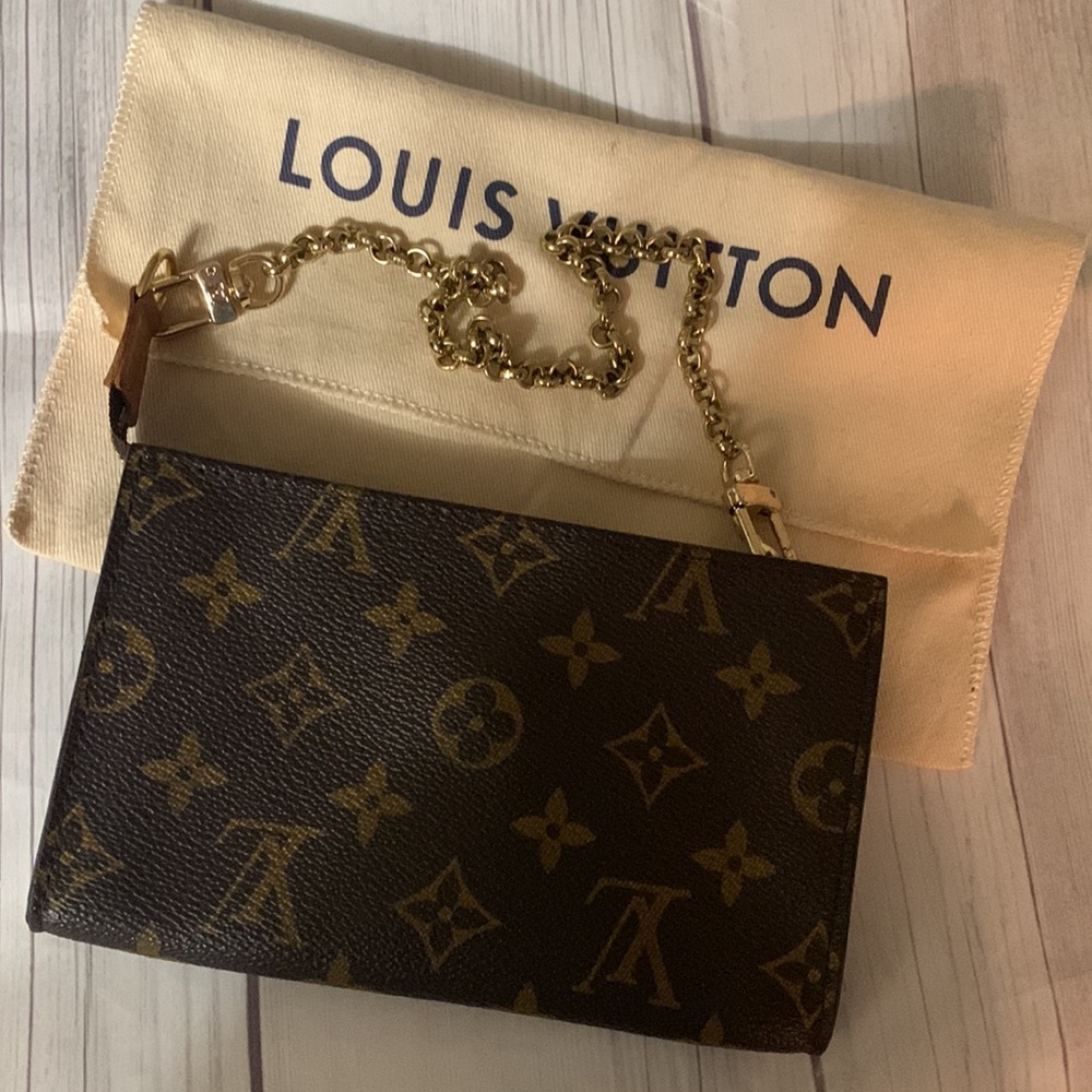 Authentic Luis Vuitton monogram pouch and LV chain totally authentic the chain